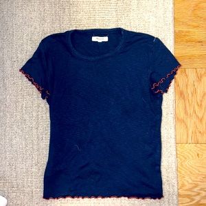 Navy blue t-shirt with orange embroidery :)